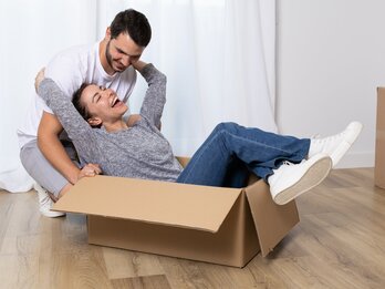 Happy,Couple,Moving,To,Their,New,House.,Home,,People,,Moving